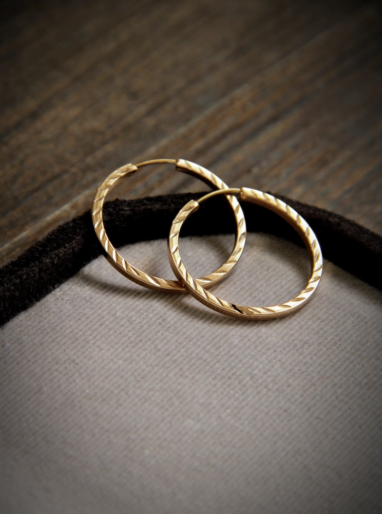 گوشواره حلقه ای امگا طرح خط دار