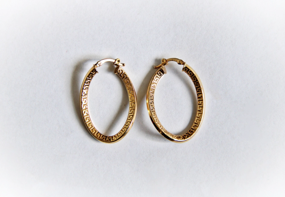 گوشواره قطره ای امگا طرح ورساچه